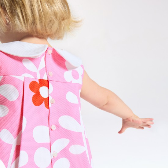 Baby girl dress with plant motif